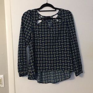 Dressy shirt! Triangle cut outs in front and back